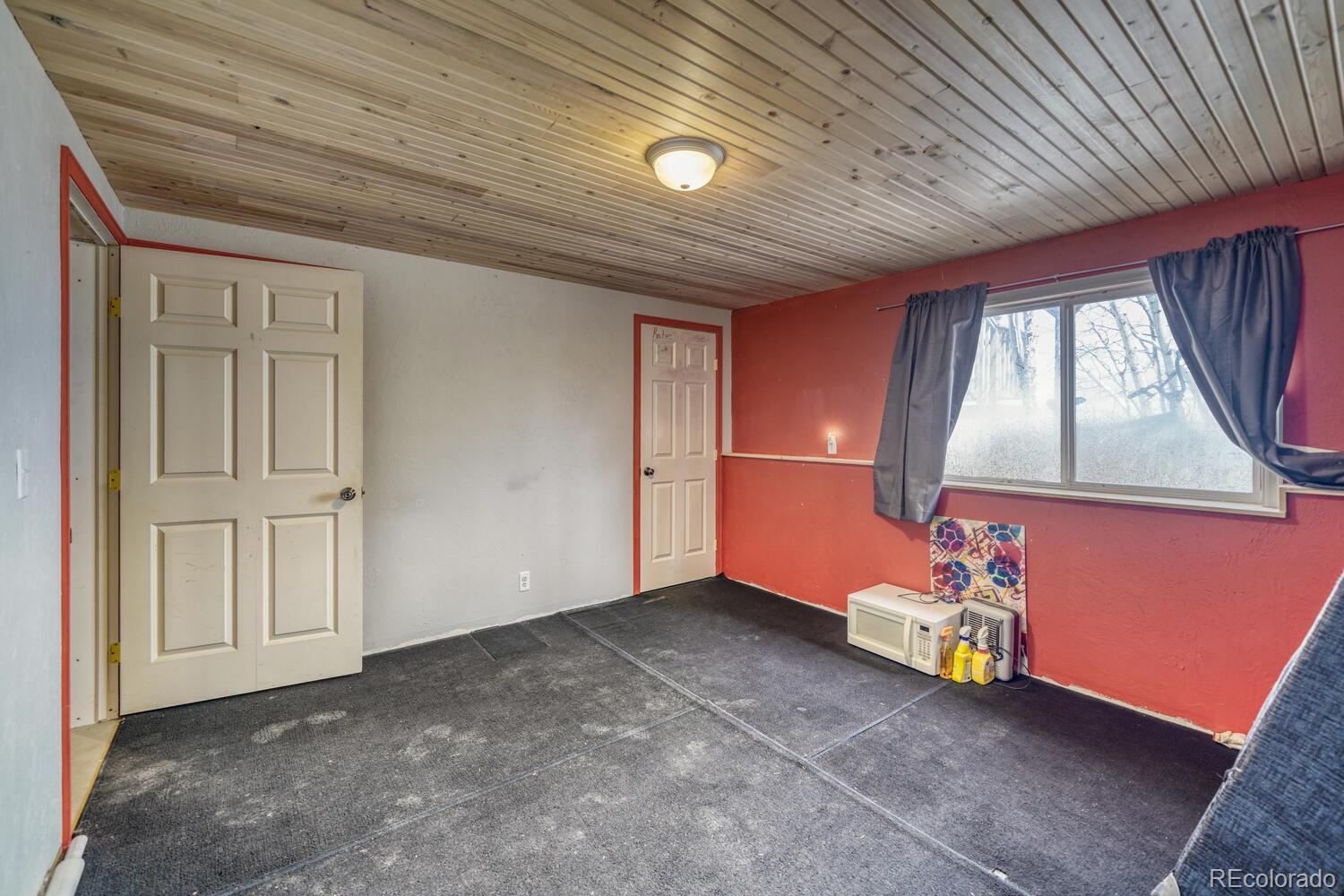 246 Sombrero Road Hartsel, CO 80449 - Photo 23 of 35 an empty room with windows