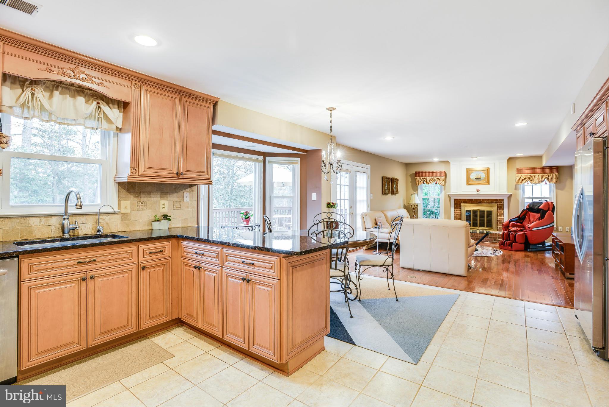 7724 Huntsman Boulevard Springfield, VA 22153 - Photo 14 of 30 Kitchen to Living Room View