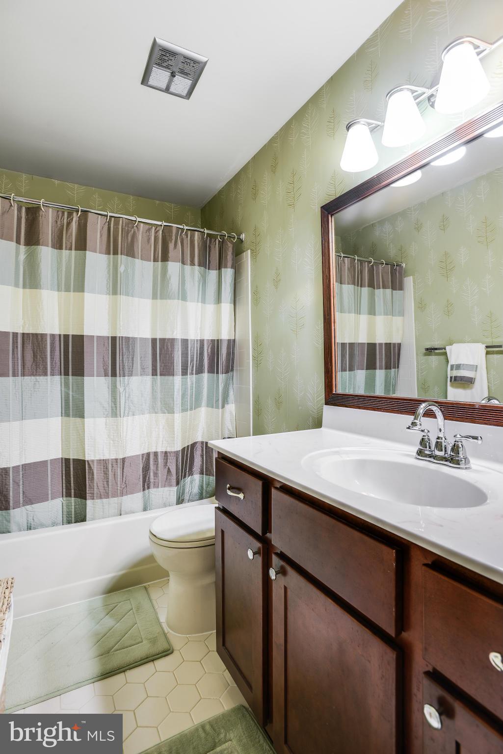 7724 Huntsman Boulevard Springfield, VA 22153 - Photo 24 of 30 Upper Level Bathroom
