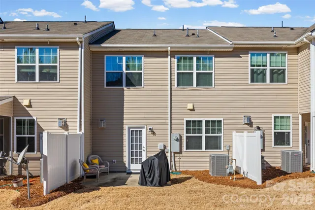 a front view of a house with a patio