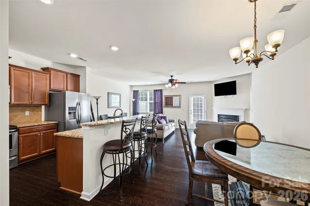a view of kitchen dining table and chairs
