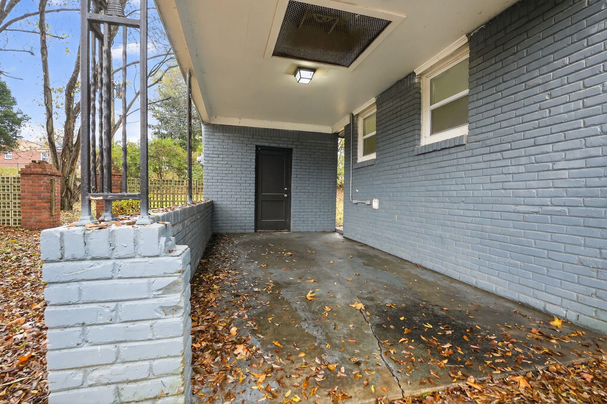 177 East Raines Road Memphis, TN 38109 - Photo 30 of 32 a view of entryway with a front door and porch