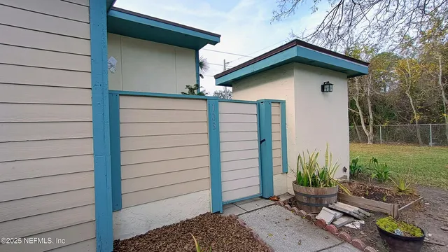 a kitchen with granite countertop cabinets stainless steel appliances and a counter top space