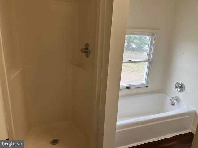 121 Church Road Warwick, MD 21912 - Photo 17 of 29 a white bath tub sitting next to a shower