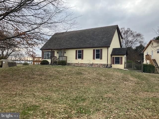 121 Church Road Warwick, MD 21912 - Photo 3 of 29 a front view of a house with a garden