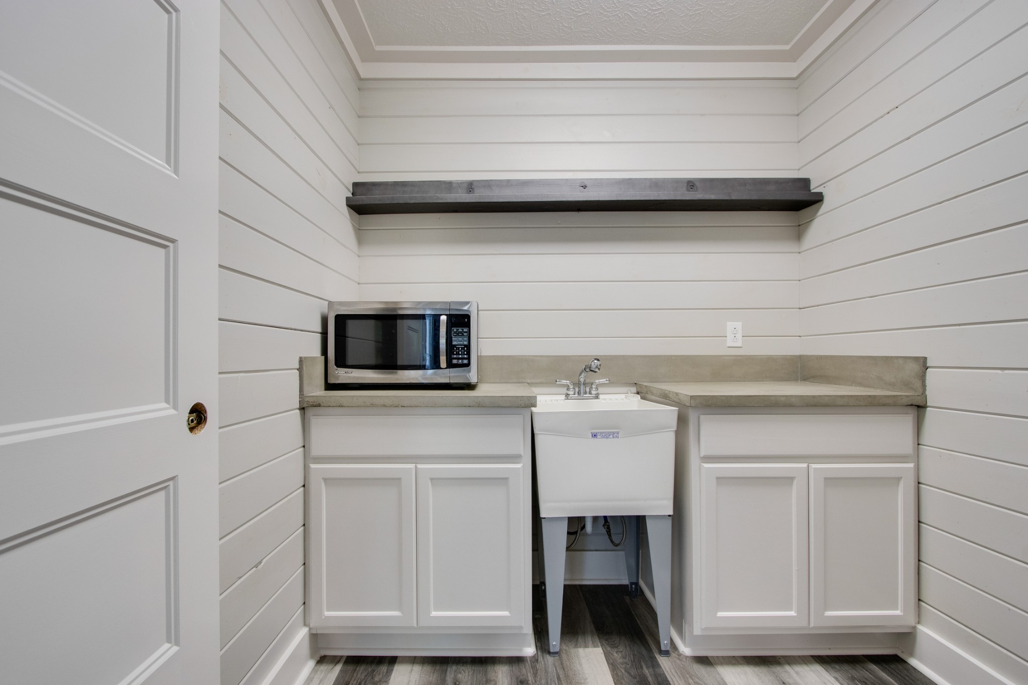 851 Sullivan Bend Road Mount Juliet, TN 37122 - Photo 24 of 50 a kitchen with a refrigerator and cabinets