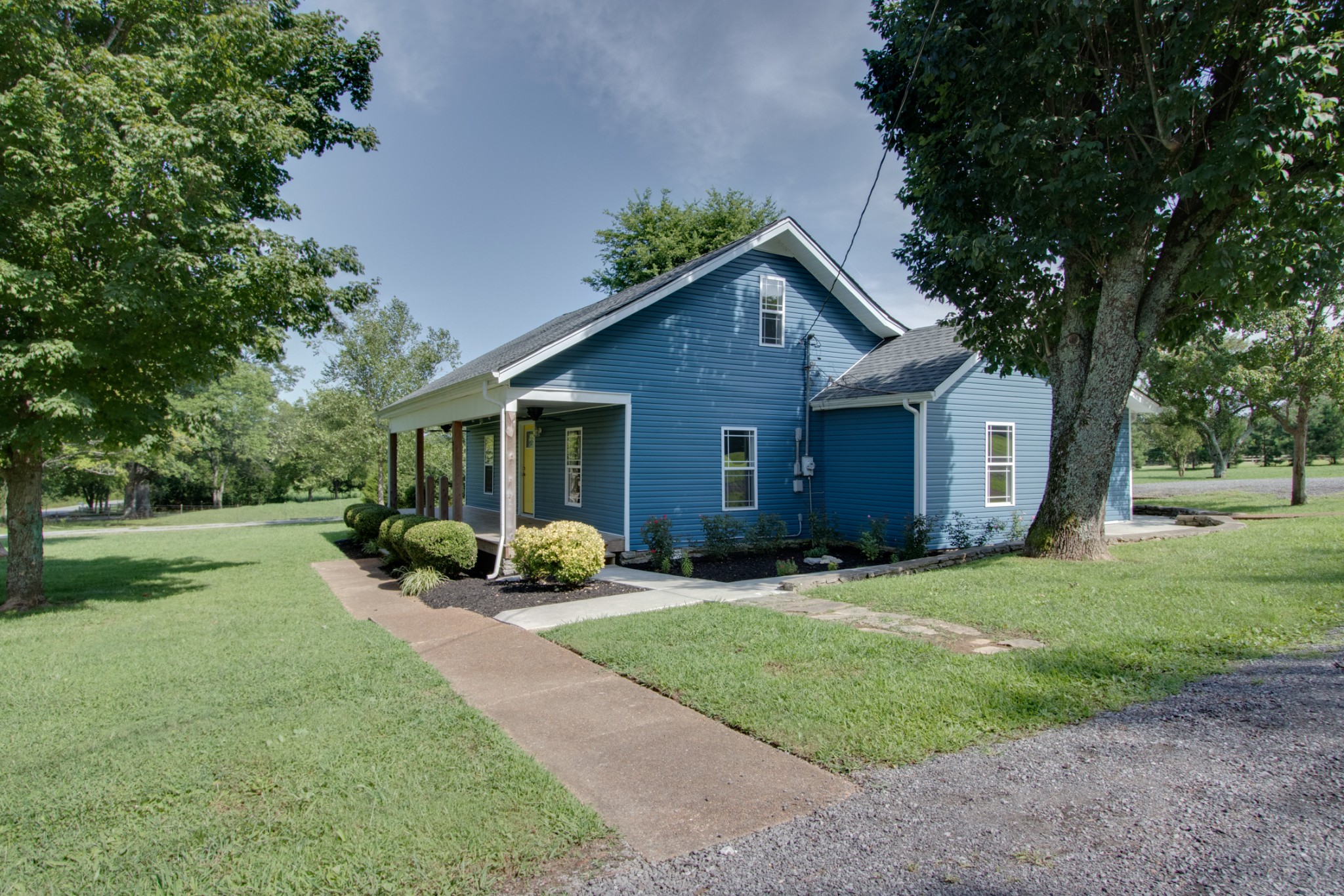 851 Sullivan Bend Road Mount Juliet, TN 37122 - Photo 6 of 50 a front view of a house with a yard and trees