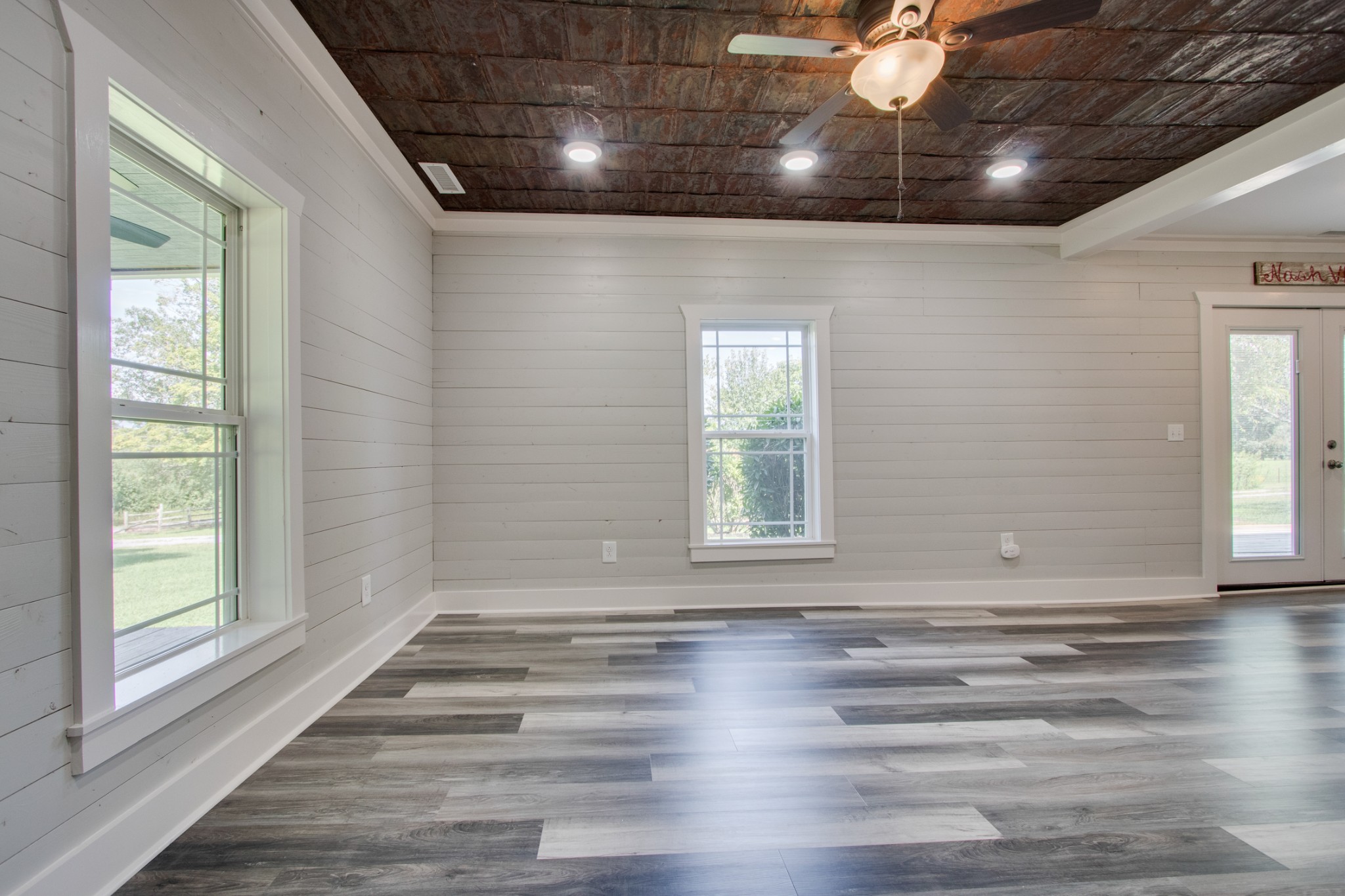 851 Sullivan Bend Road Mount Juliet, TN 37122 - Photo 10 of 50 a view of empty room with wooden floor and fan