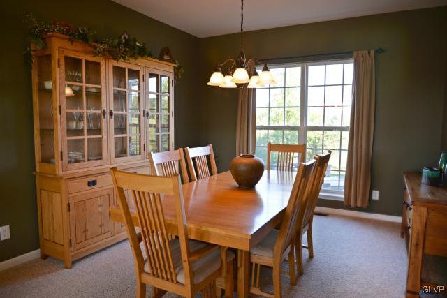 9067 Pathfinder Road Breinigsville, PA 18031 - Photo 18 of 36 DINING ROOM OVERLOOKS PAVER PATIO