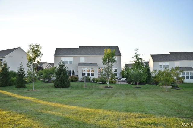 9067 Pathfinder Road Breinigsville, PA 18031 - Photo 3 of 36 REAR FACADE FROM ACROSS OPEN SPACE
