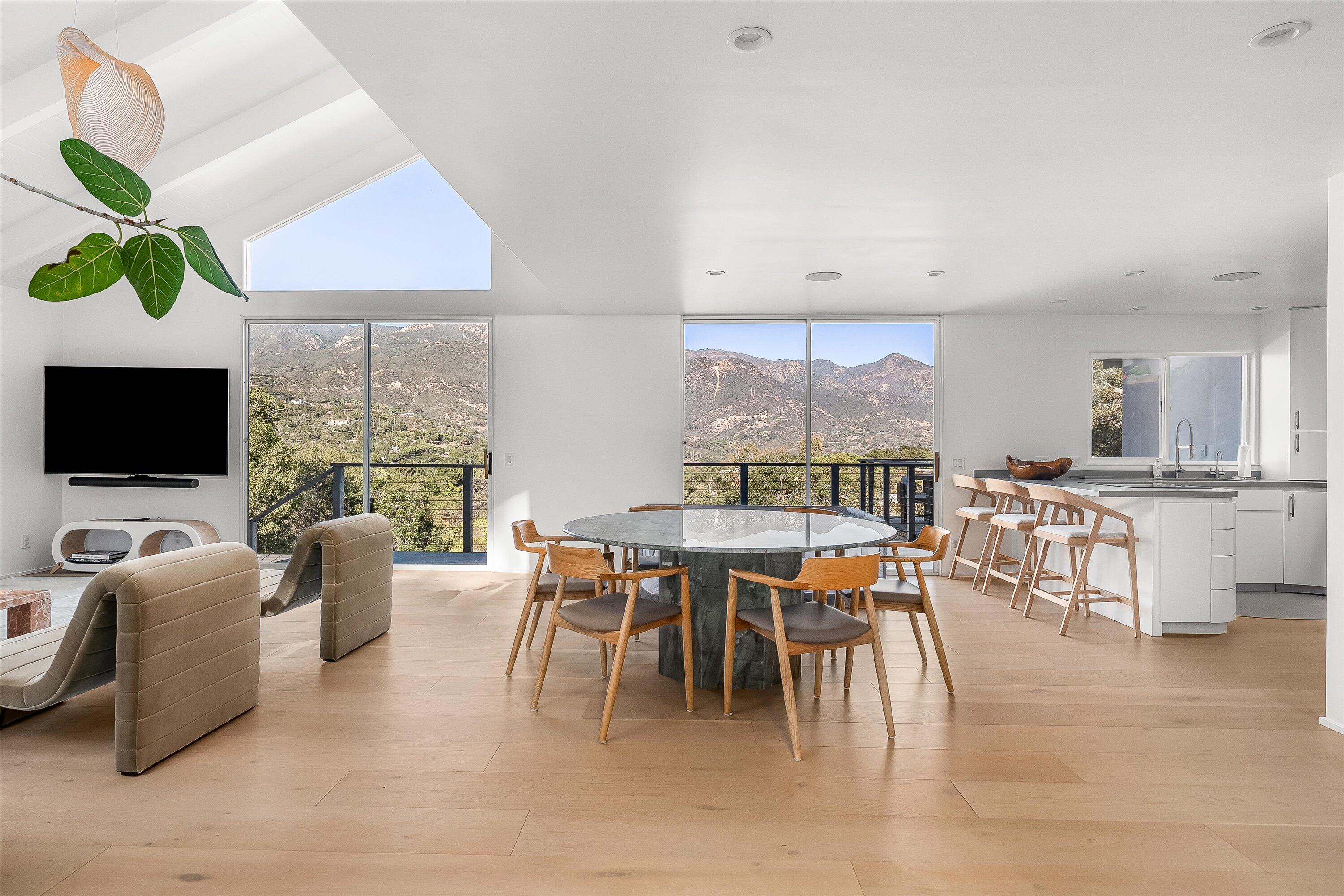 1438 Hillcrest Road Santa Barbara, CA 93103 - Photo 4 of 22 a view of a dining room with furniture window and outside view