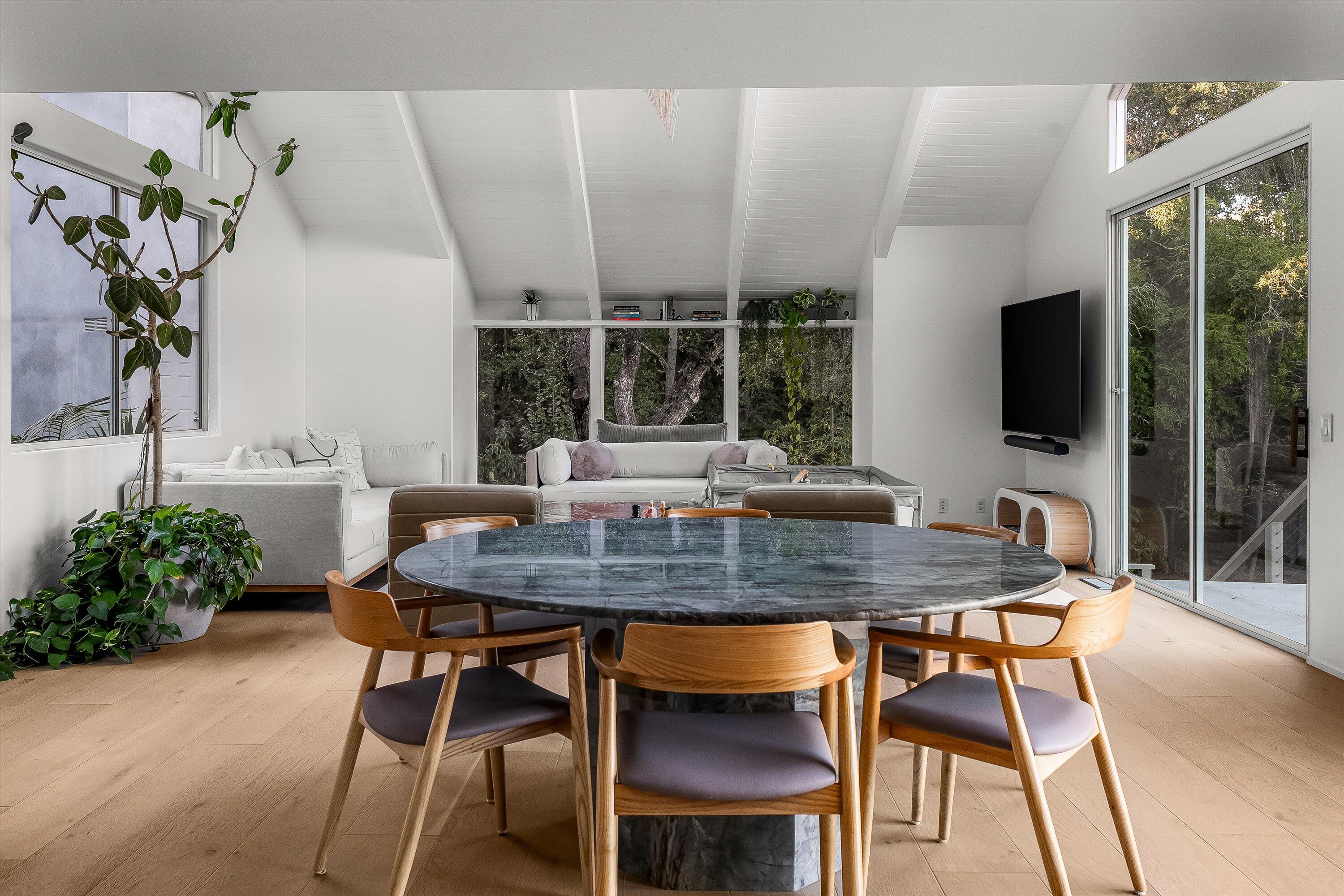 1438 Hillcrest Road Santa Barbara, CA 93103 - Photo 5 of 22 a view of a dining room with furniture and wooden floor