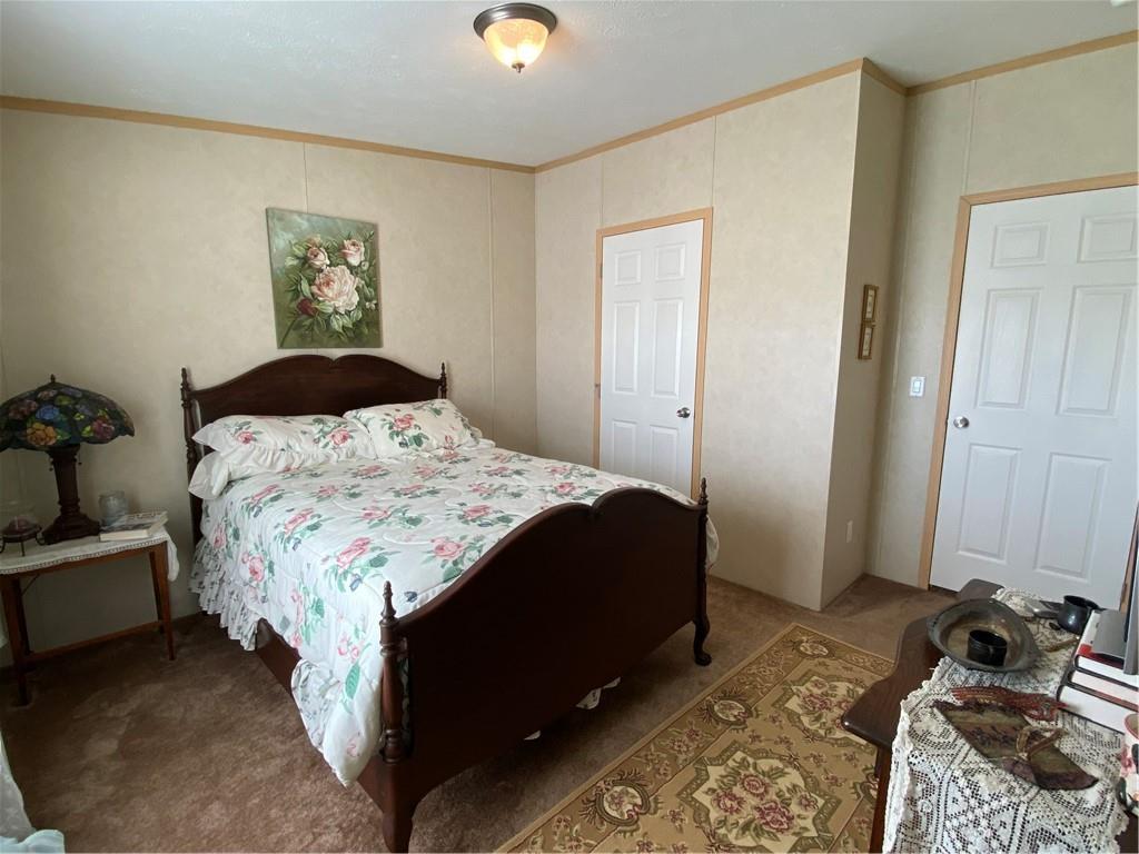 332 Iron Bite Drive Tarrs, PA 15688 - Photo 11 of 19 a bedroom with a bed and a cabinets