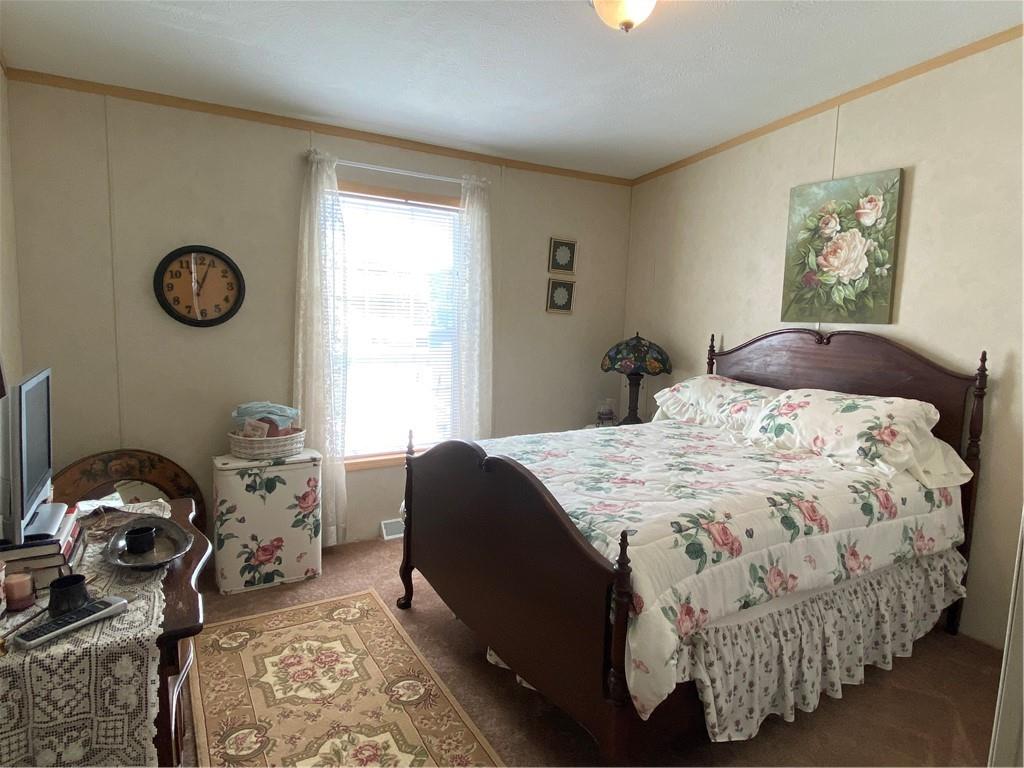 332 Iron Bite Drive Tarrs, PA 15688 - Photo 12 of 19 a bedroom with a bed and dresser