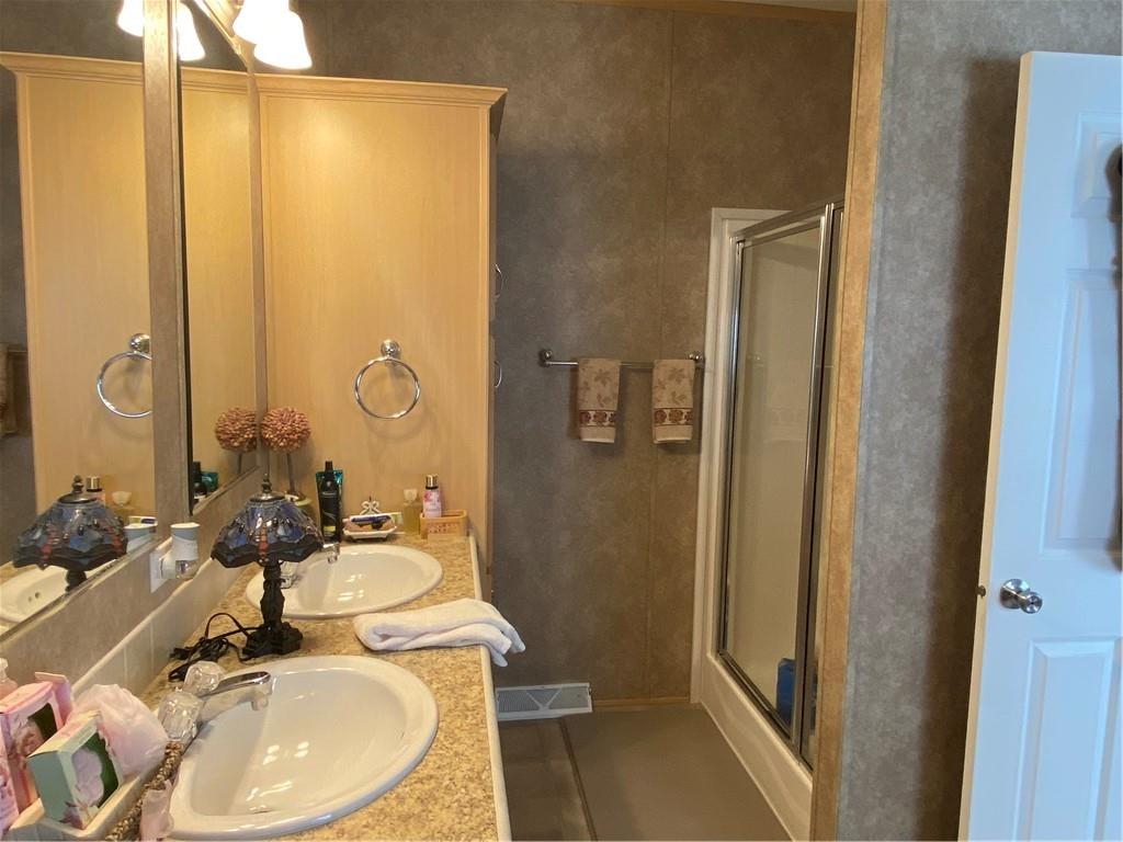 332 Iron Bite Drive Tarrs, PA 15688 - Photo 15 of 19 a bathroom with a sink and a mirror
