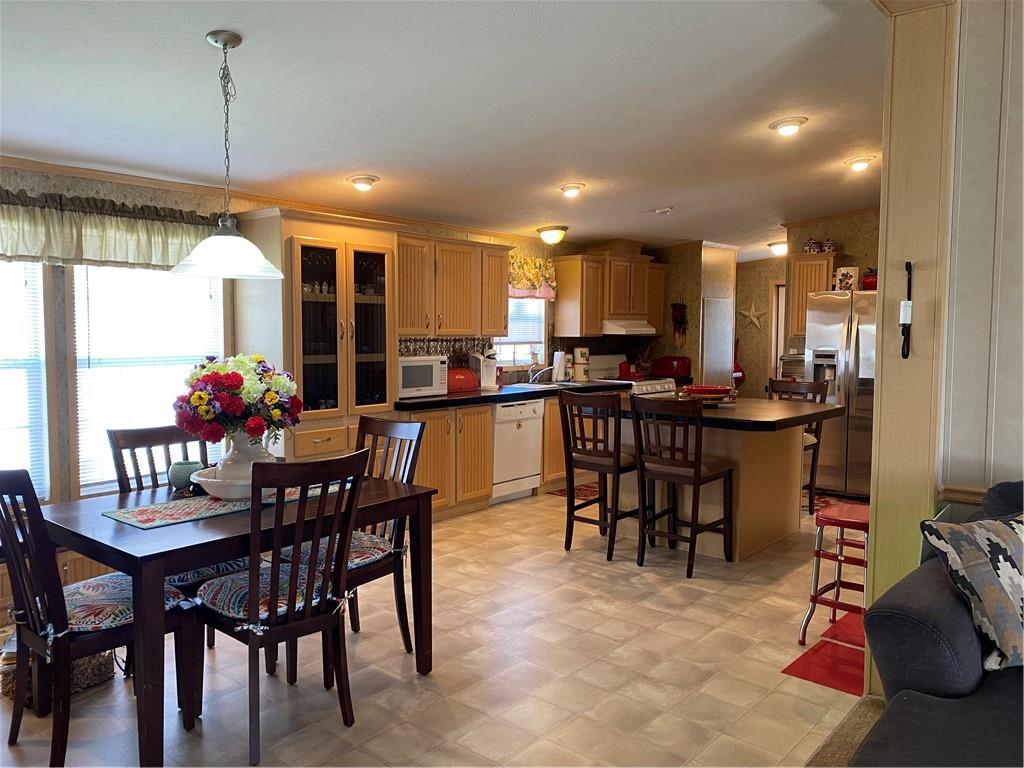 332 Iron Bite Drive Tarrs, PA 15688 - Photo 4 of 19 a view of a dining room with furniture
