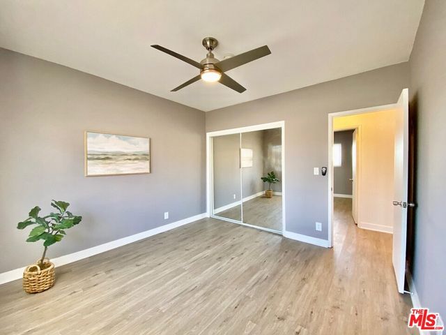 a view of a livingroom with a hardwood floor