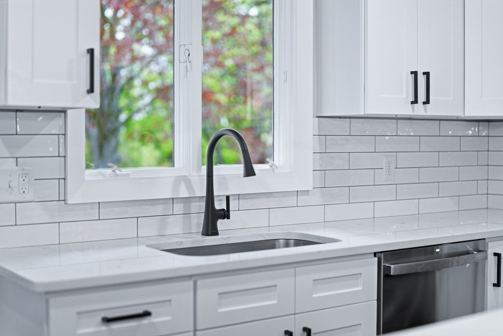1 Ayrshire Road Worcester, MA 01604 - Photo 5 of 41 a kitchen with a sink and cabinets