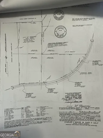 a view of a refrigerator in kitchen