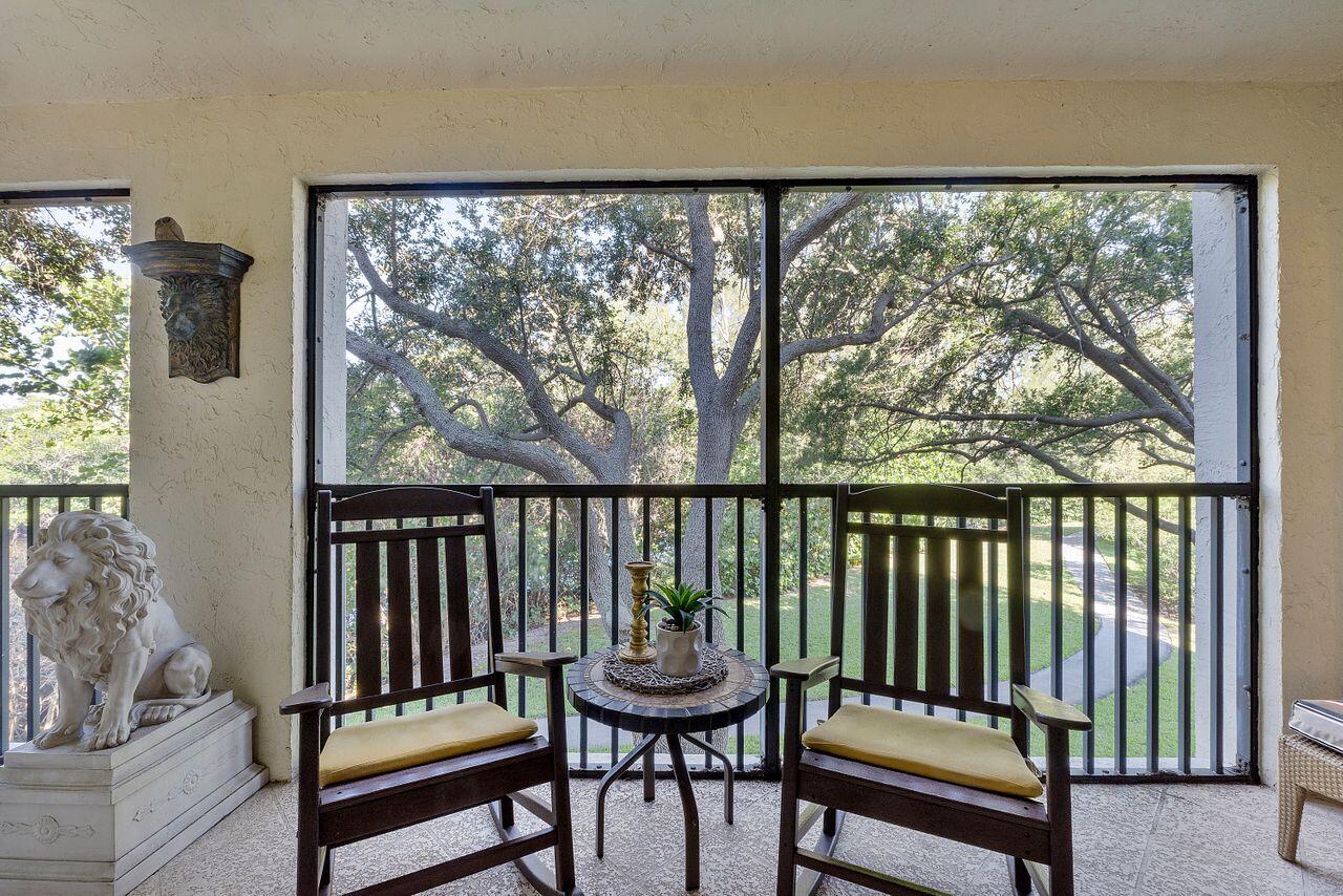 500 Ocean Trail Way, Unit 201 Jupiter, FL 33477 - Photo 33 of 58 a view of a two chairs in the balcony