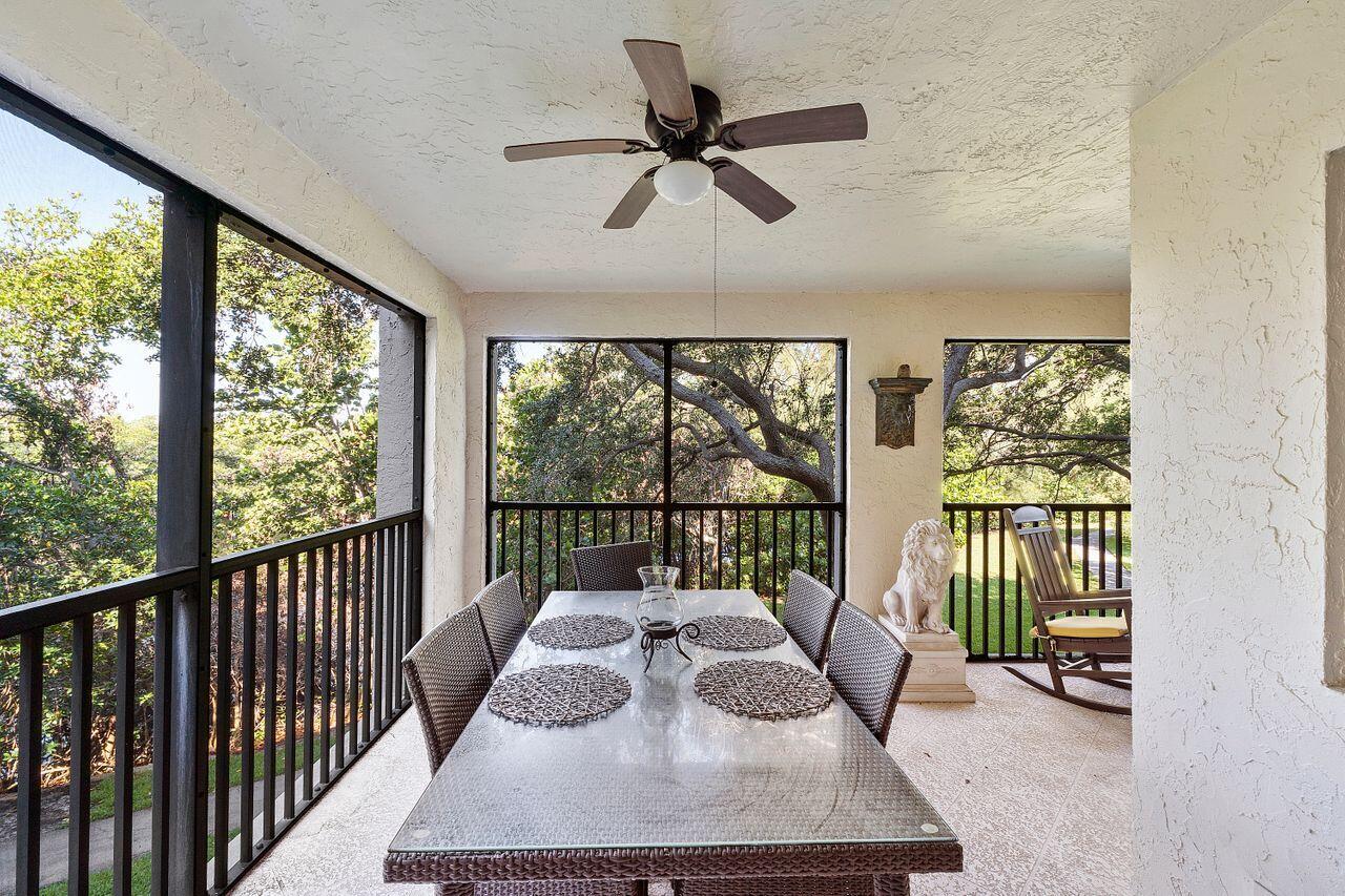 500 Ocean Trail Way, Unit 201 Jupiter, FL 33477 - Photo 35 of 58 a living room with a large window
