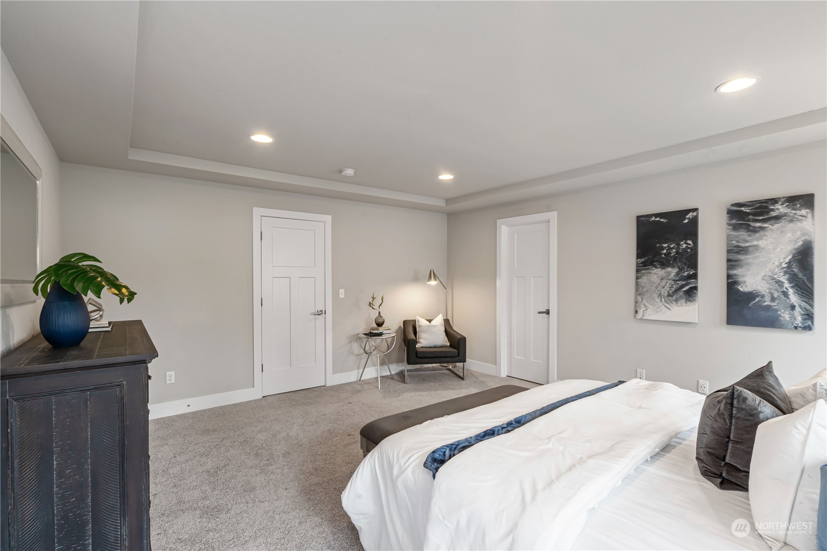 114 176th Place Southwest Bothell, WA 98012 - Photo 21 of 31 a bedroom with a bed and a potted plant