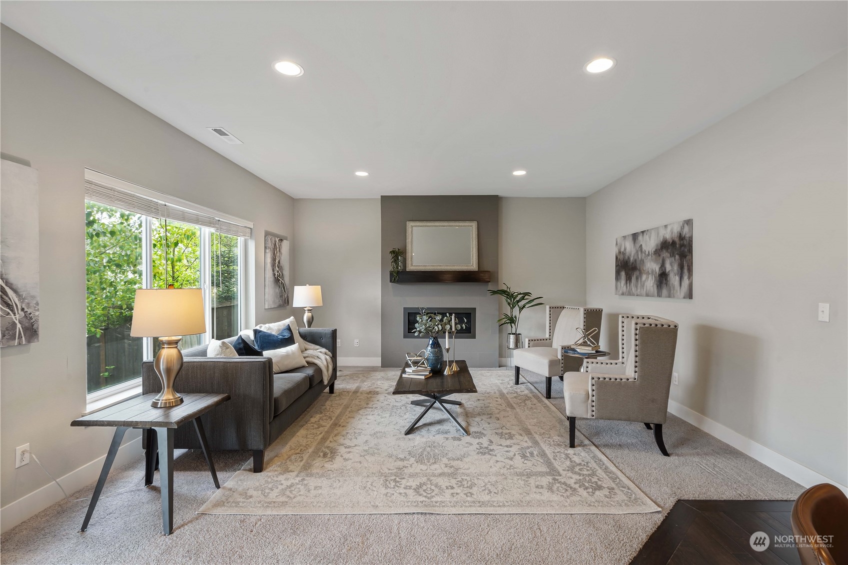 114 176th Place Southwest Bothell, WA 98012 - Photo 4 of 31 a living room with furniture and a fireplace