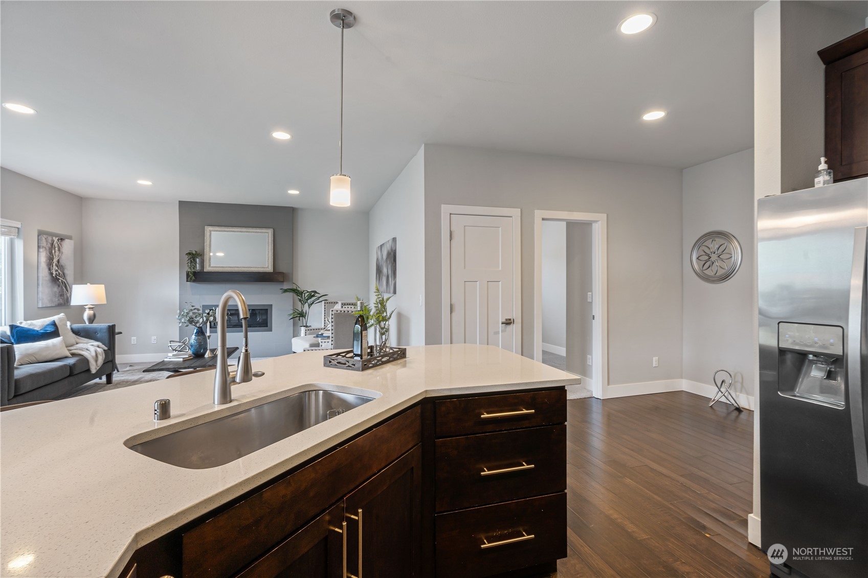 114 176th Place Southwest Bothell, WA 98012 - Photo 10 of 31 a kitchen with a sink cabinets and wooden floor