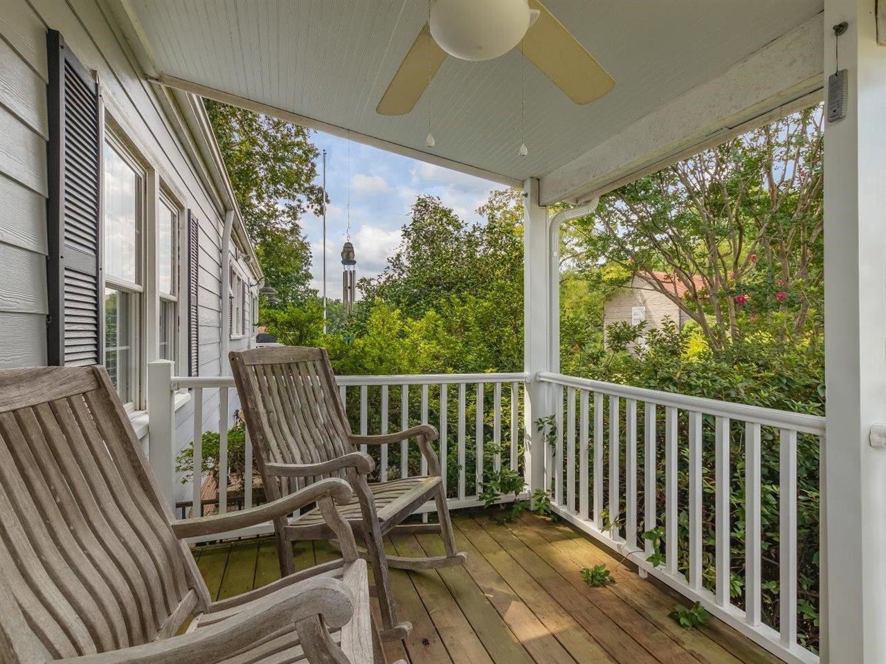 5609 Dona Road Julian, NC 27283 - Photo 16 of 63 a view of balcony with wooden floor and outdoor seating