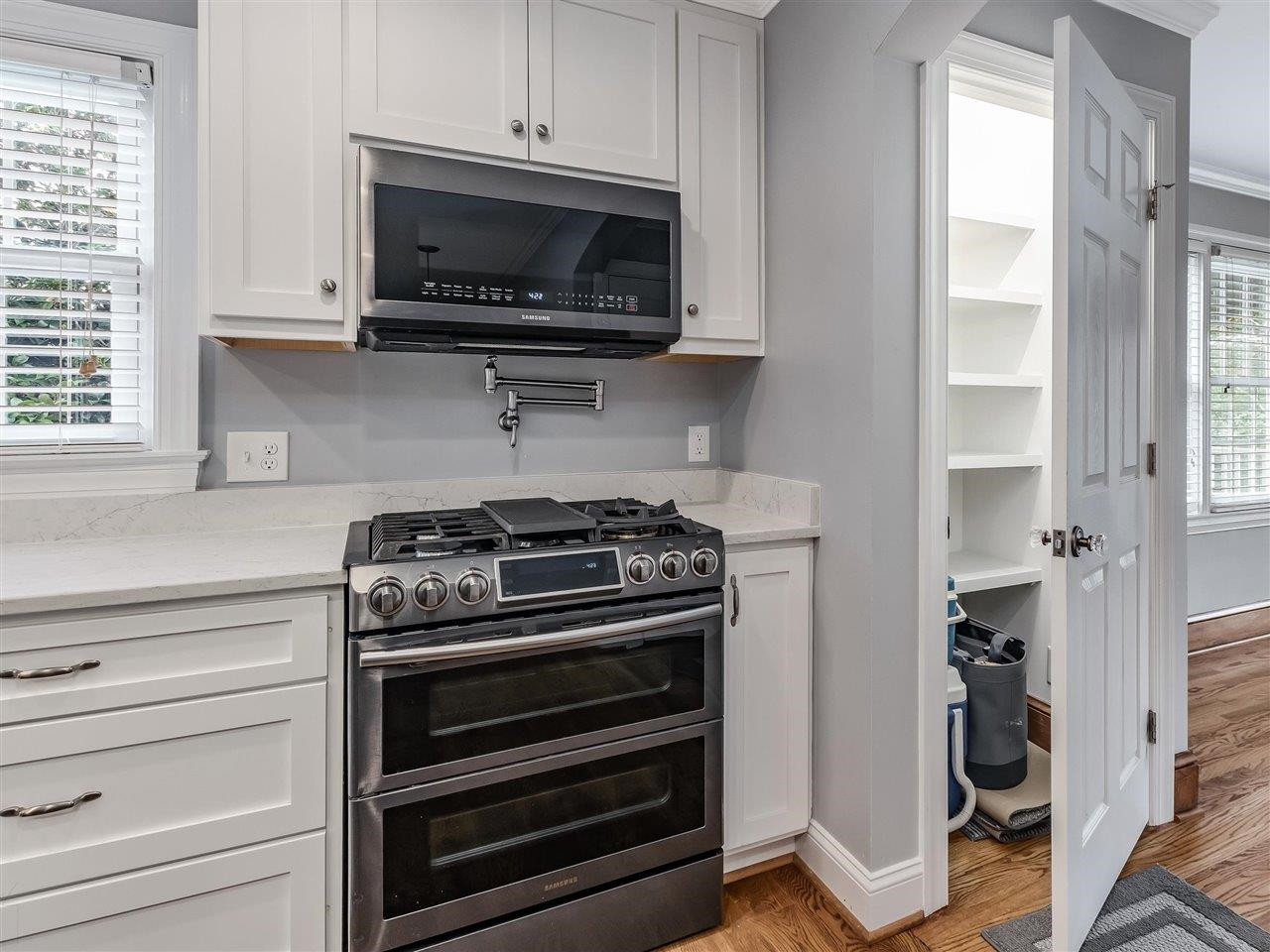 5609 Dona Road Julian, NC 27283 - Photo 21 of 63 a kitchen with a stove and a microwave