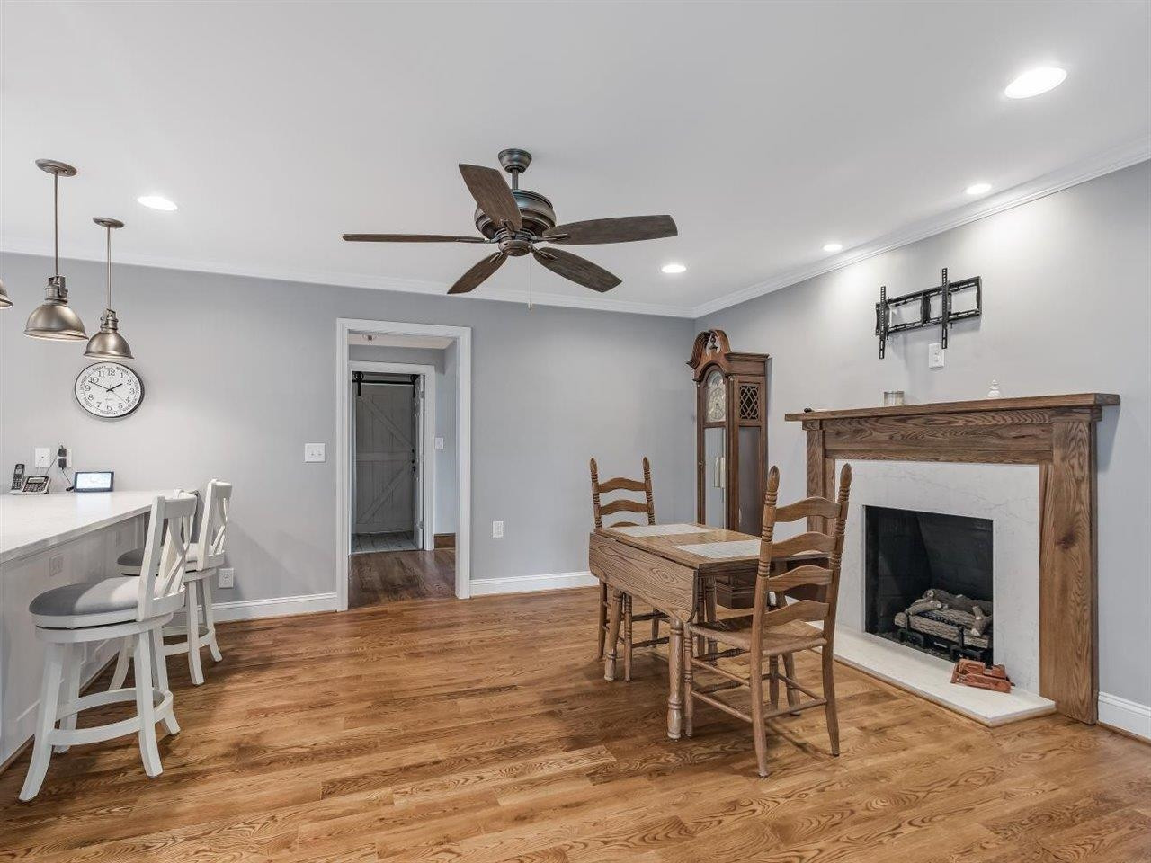 5609 Dona Road Julian, NC 27283 - Photo 25 of 63 a view of a livingroom with furniture and a fireplace