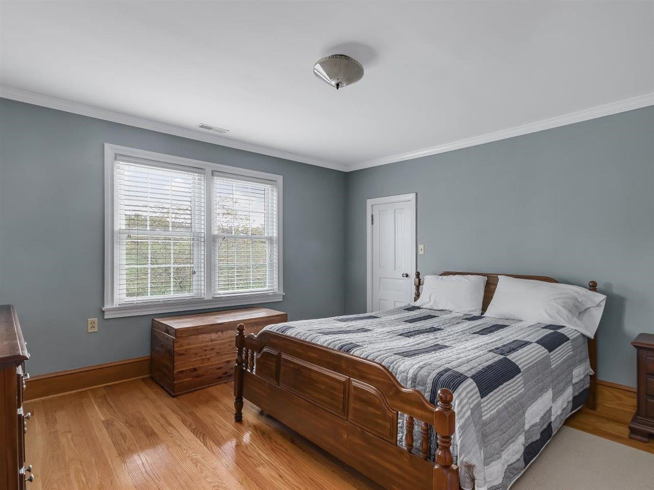 5609 Dona Road Julian, NC 27283 - Photo 41 of 63 a bedroom with a bed and a window