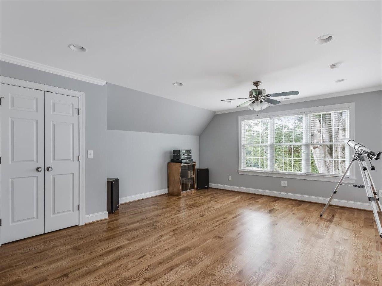 5609 Dona Road Julian, NC 27283 - Photo 43 of 63 a view of an empty room with a window and wooden floor
