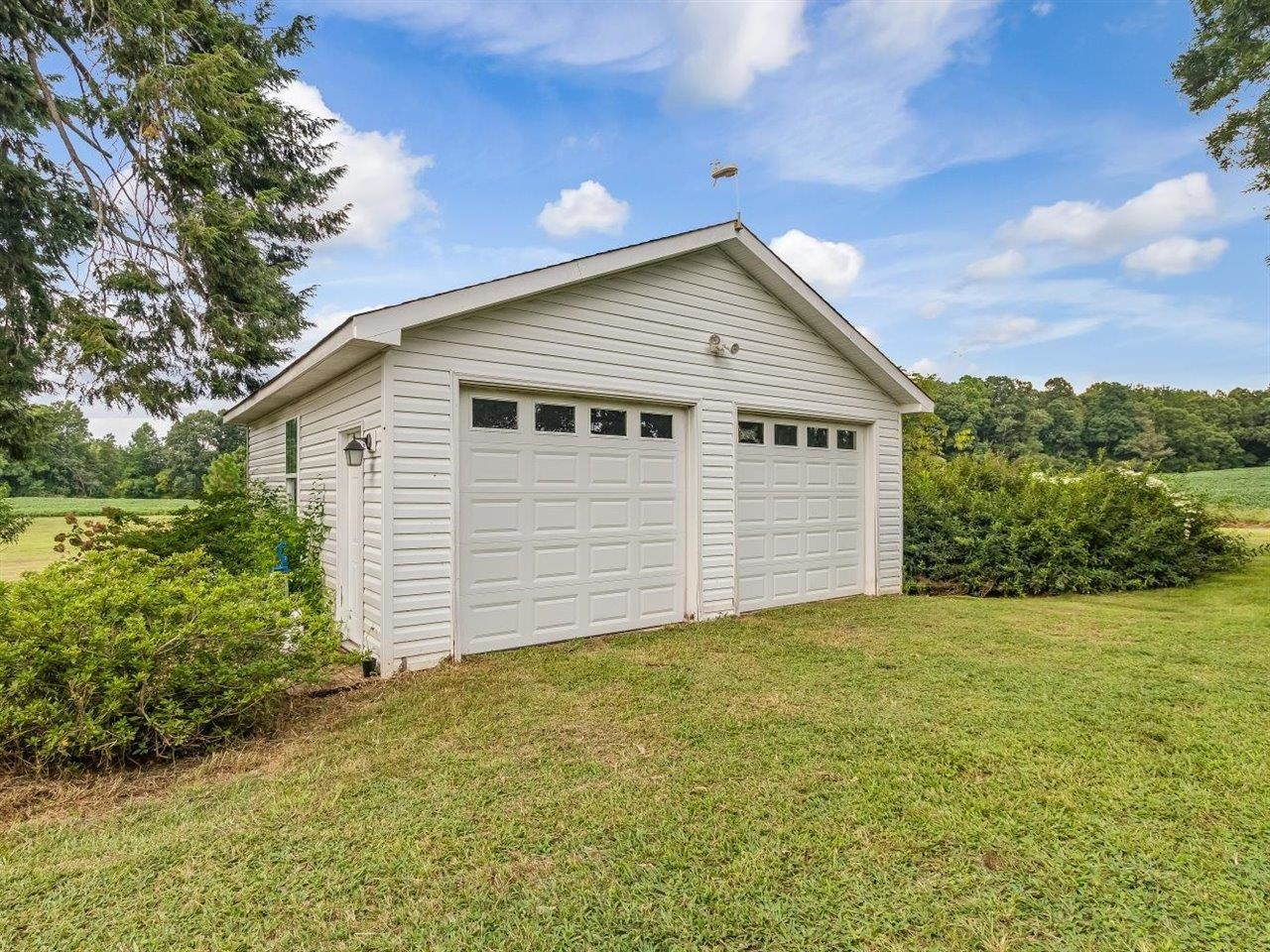 5609 Dona Road Julian, NC 27283 - Photo 53 of 63 a view of a house with a yard
