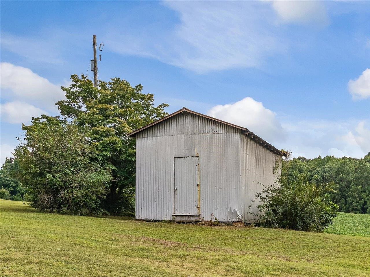 5609 Dona Road Julian, NC 27283 - Photo 56 of 63 a house view with a garden space