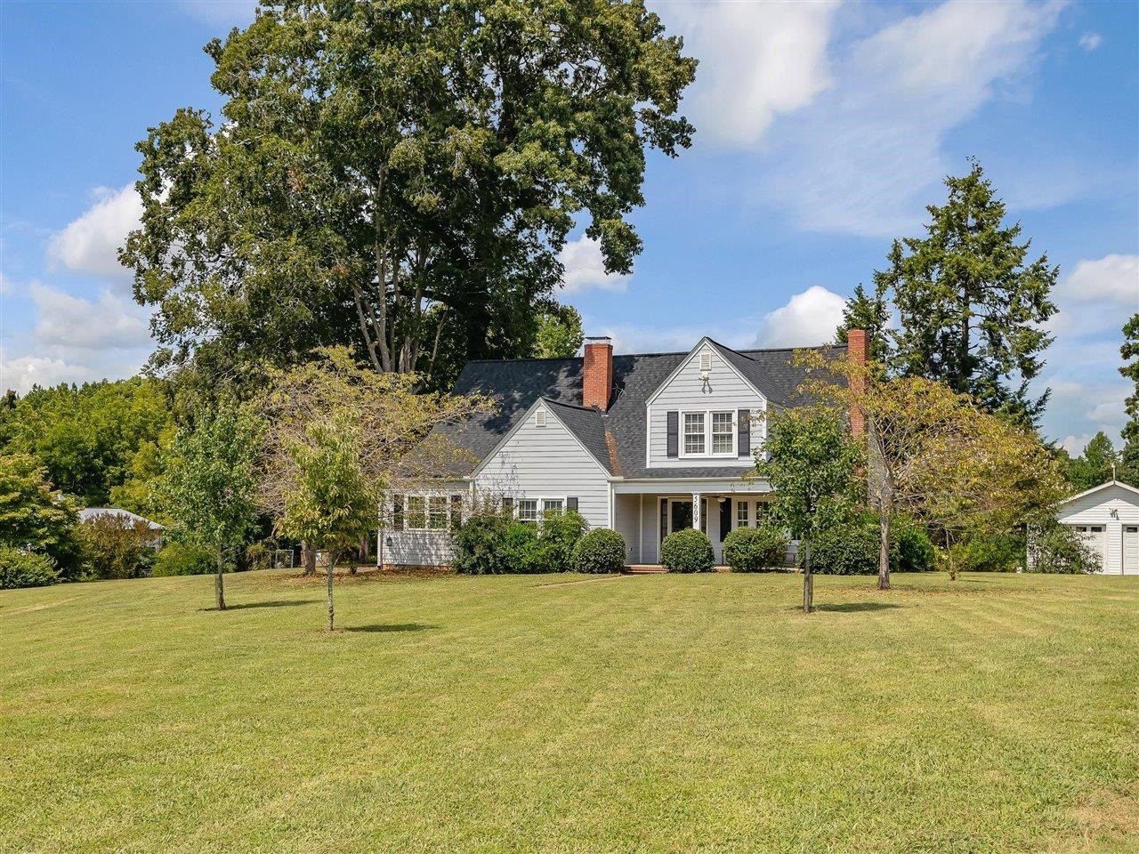 5609 Dona Road Julian, NC 27283 - Photo 6 of 63 a view of a house with a yard