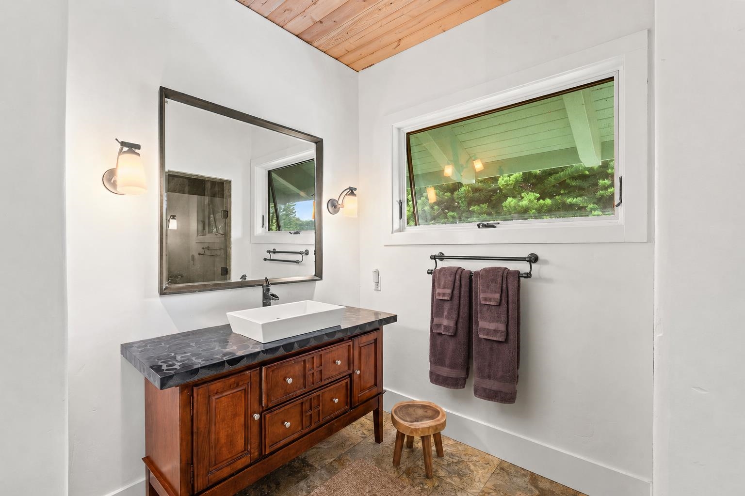1949 West Kuiaha Road Haiku, HI 96708 - Photo 21 of 49 a bathroom with a sink a mirror and a toilet