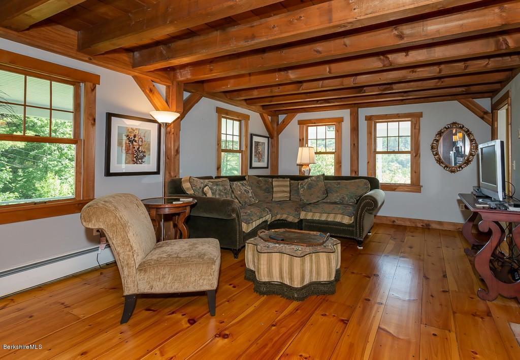 430 East River Road Chester, MA 01011 - Photo 14 of 42 a living room with furniture and a window
