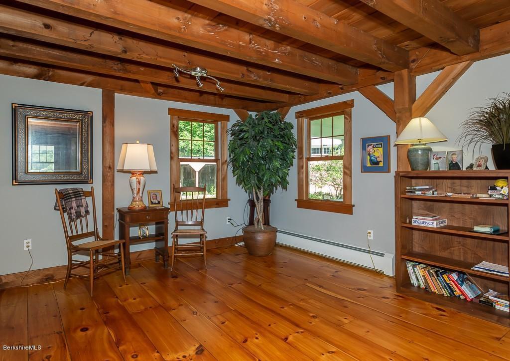 430 East River Road Chester, MA 01011 - Photo 17 of 42 a living room with furniture and a wooden floor
