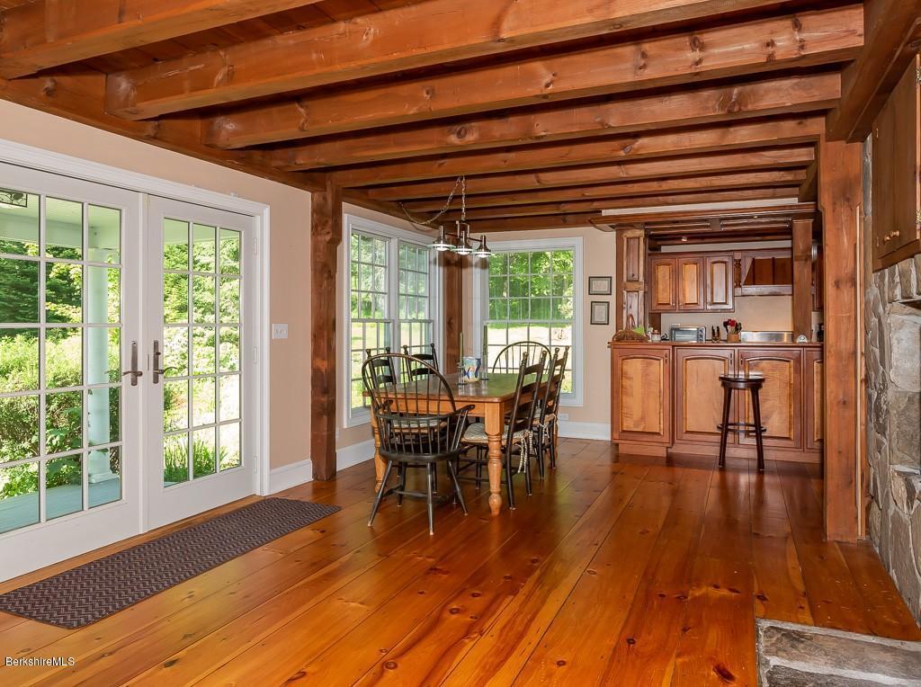 430 East River Road Chester, MA 01011 - Photo 21 of 42 a dining room with furniture window and wooden floor