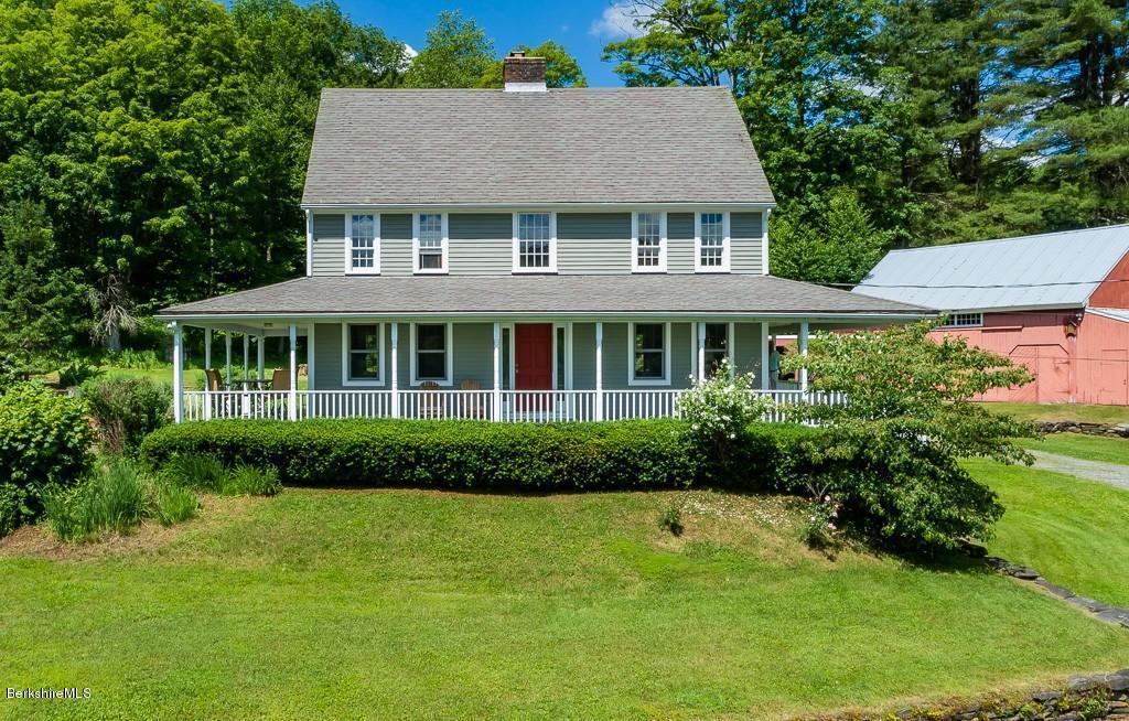 430 East River Road Chester, MA 01011 - Photo 4 of 42 a house with swimming pool in front of it