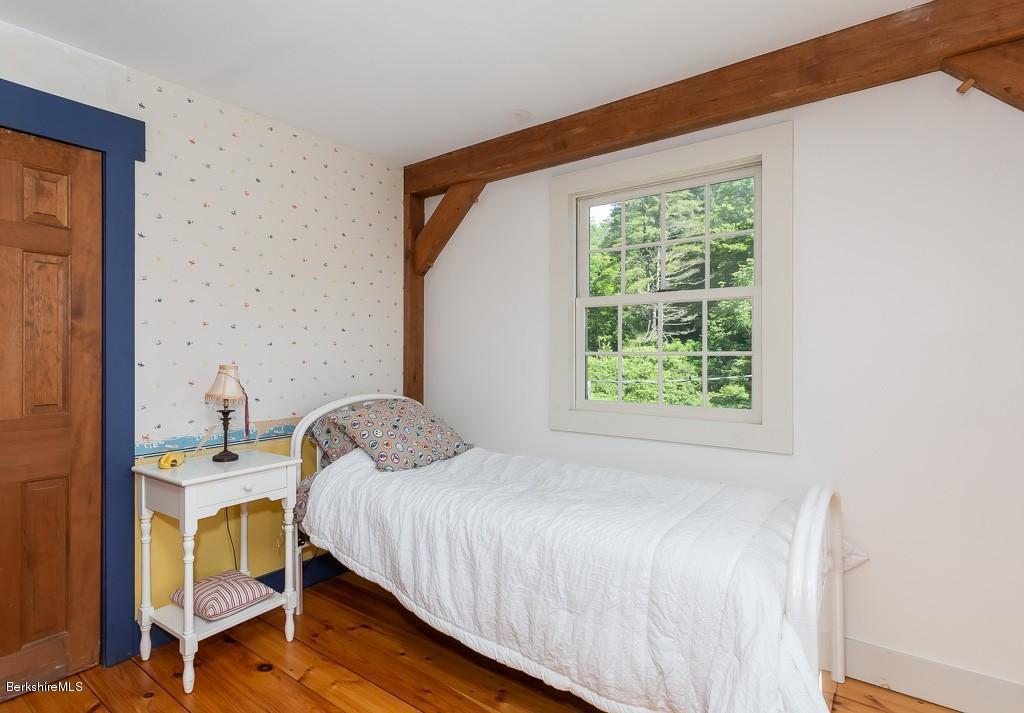 430 East River Road Chester, MA 01011 - Photo 34 of 42 a bedroom with a bed and a window