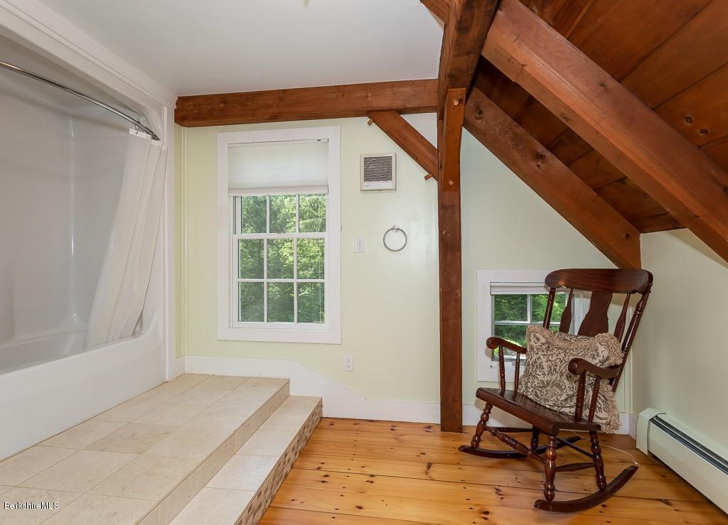 430 East River Road Chester, MA 01011 - Photo 39 of 42 a living room with furniture and a window