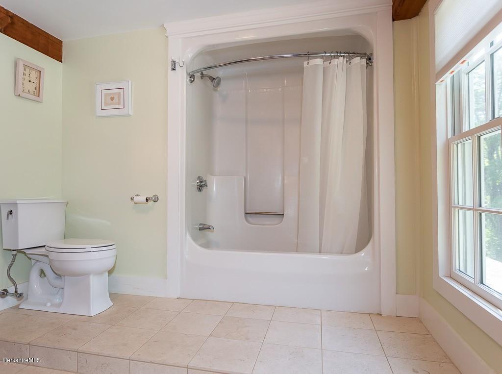 430 East River Road Chester, MA 01011 - Photo 40 of 42 a bathroom with a toilet and a shower