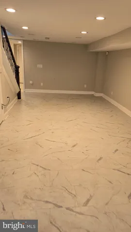 an empty room with stairs