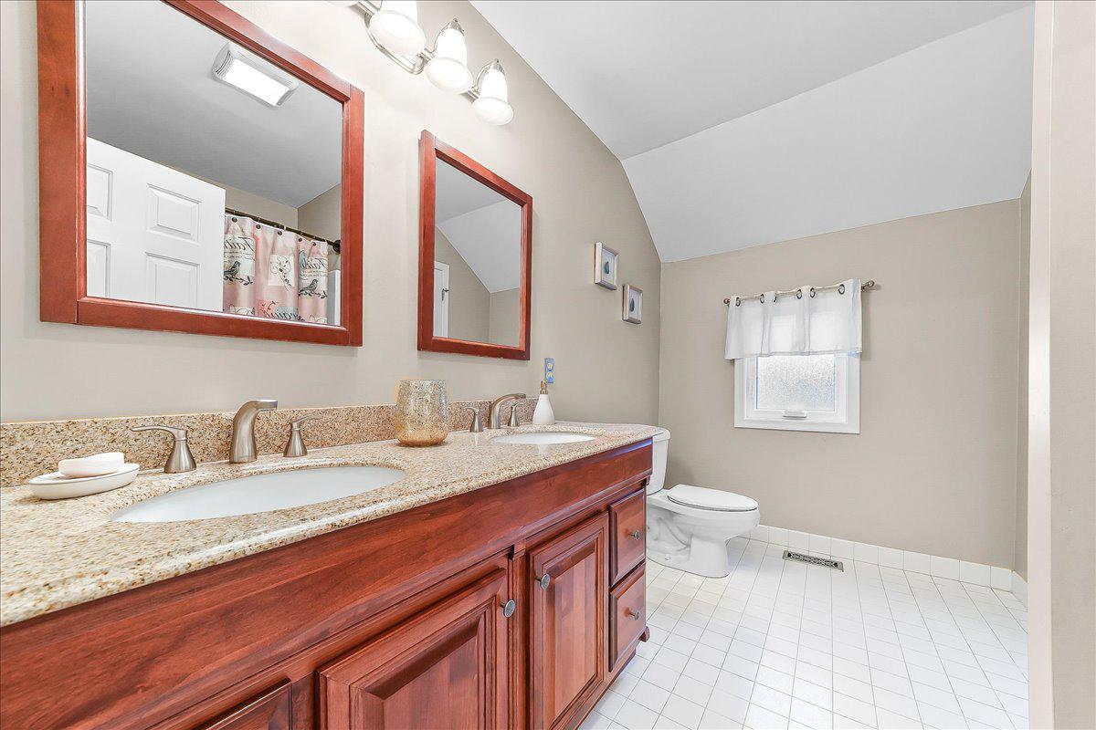 51 Ridings Way Chadds Ford, PA 19317 - Photo 48 of 57 Elegant hall bath with dual vanities.