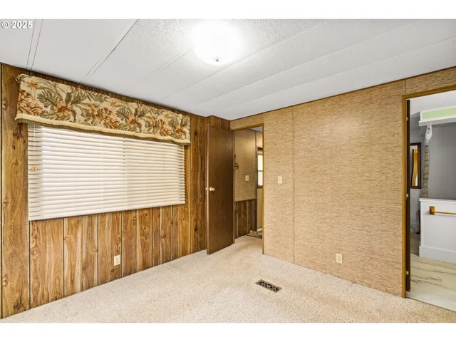 a view of a room with a window