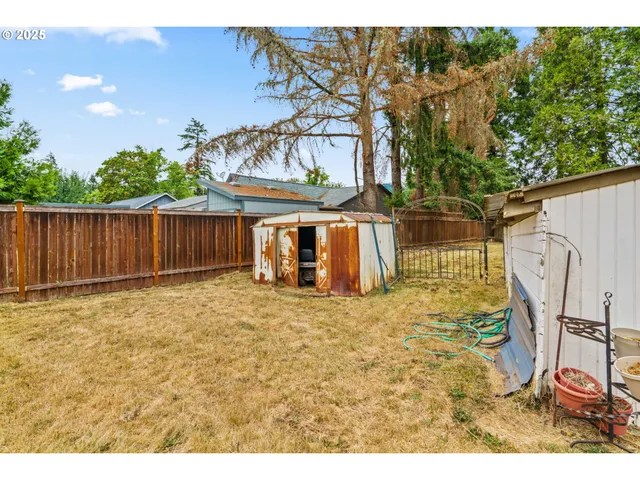 a view of backyard with deck
