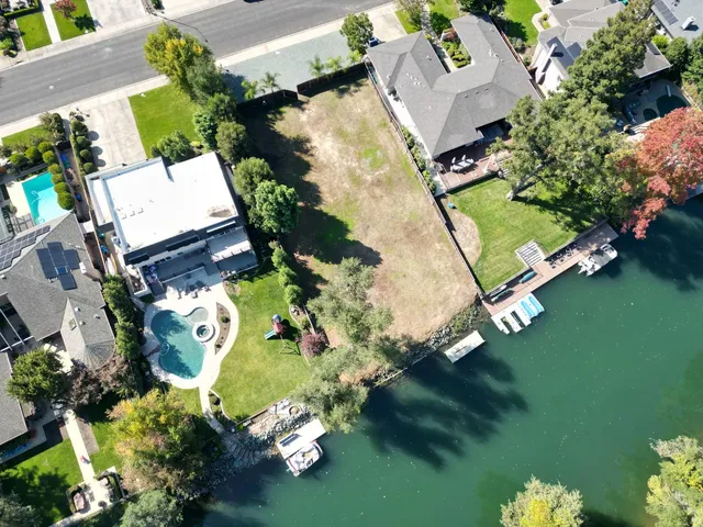 an aerial view of a house with a garden