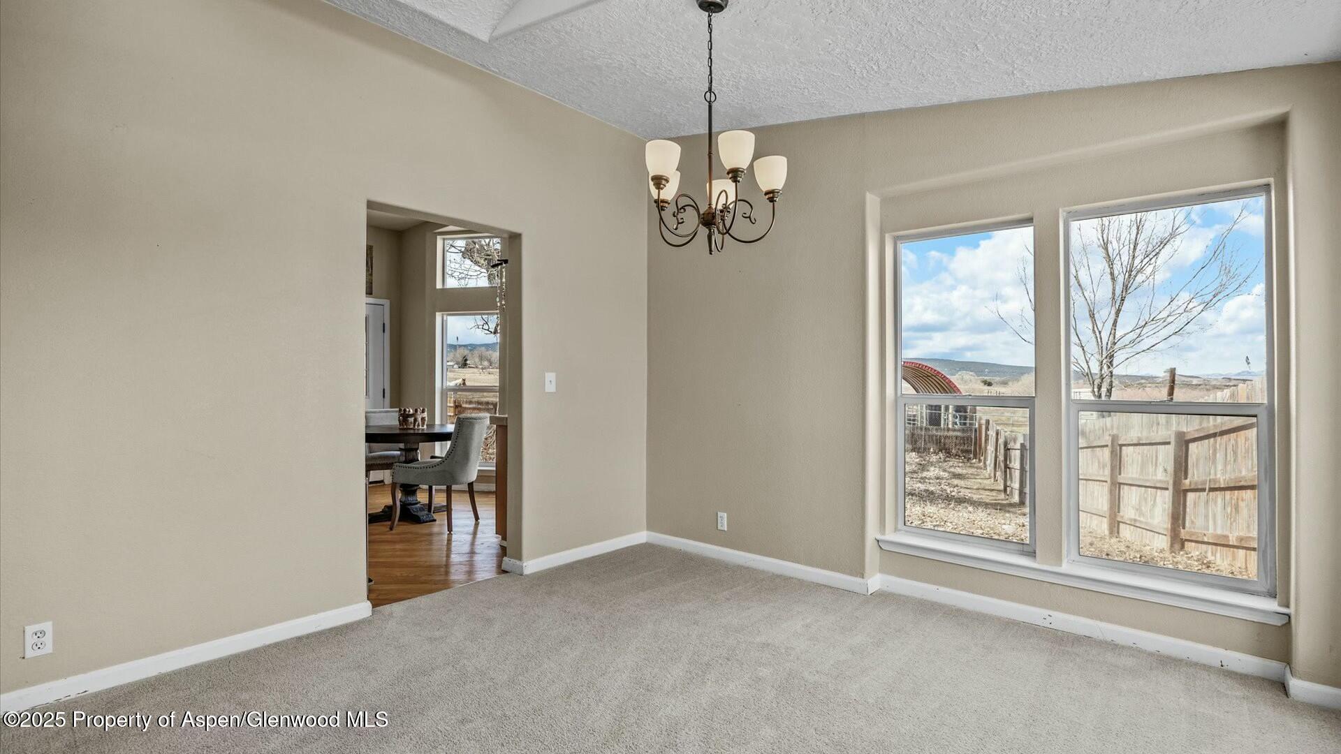 10479 50 Road Mesa, CO 81643 - Photo 15 of 42 a view of livingroom with window